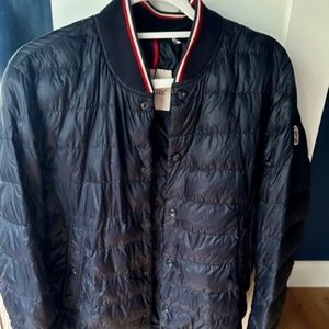 eMens Moncler size 3 light weight jacket.